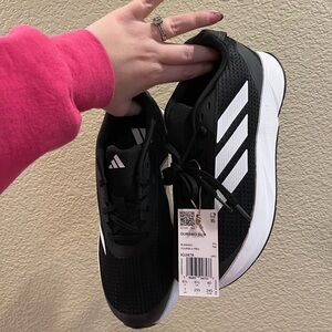 Adidas men’s Black and White Running Sneakers